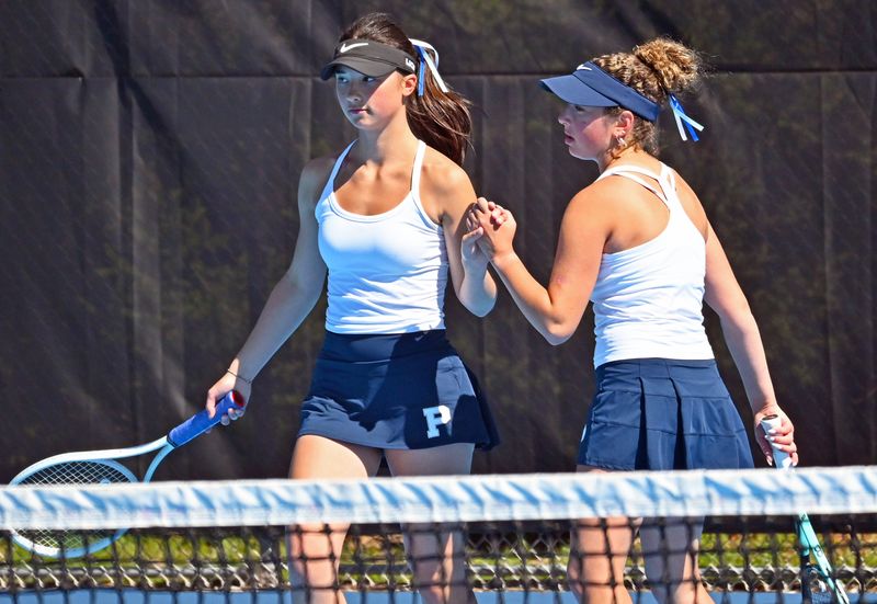 Petoskey senior Meg Gietzen (left) and junior Eva Rindfusz formed a great partnership at No. 1 doubles for the Northmen this season and claimed all-state from the coaches association recently.