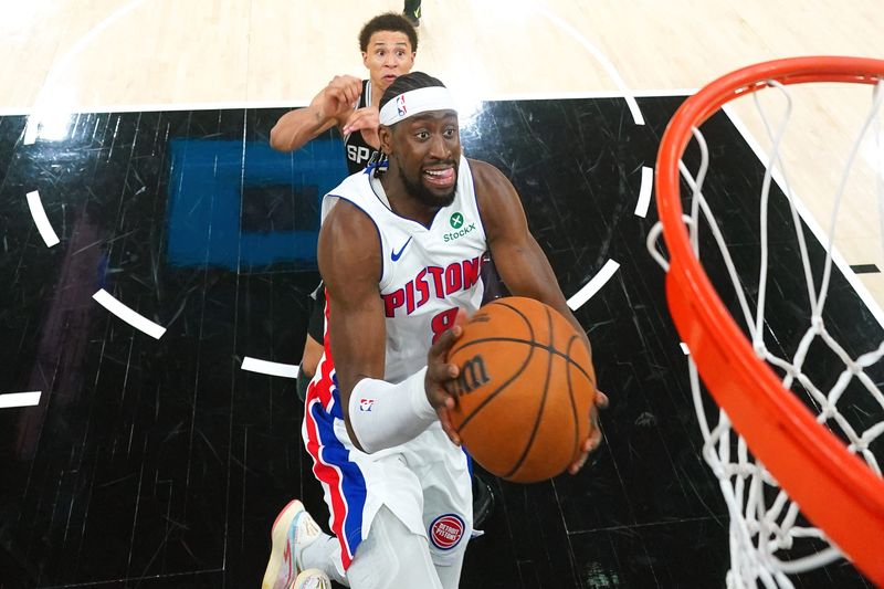 Pistons guard Caris Levert (8) drives to the basket during the second half against the Spurs at Frost Bank Center.