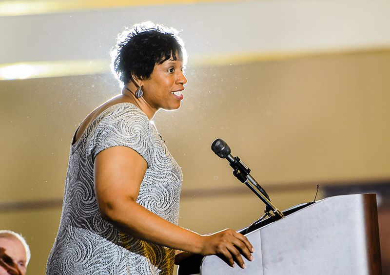 Former Everett High and South Carolina basketball star Evelyn Johnson speaks to the crowd after being honored at the Greater Lansing Sports Hall of Fame induction ceremony Thursday August 2, 2012 at the Lansing Center.