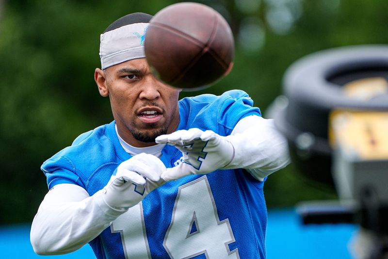 Detroit Lions wide receiver Amon-Ra St. Brown (14) warms up before practice during mini camp at Meijer Performance Center in Allen Park on Wednesday, June 17, 2026.