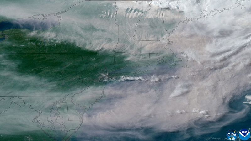 A satellite view of smoke from Canadian wildfires as it descends across the U.S. East Coast, North America, July 14, 2026.