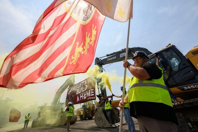 Roger Beck, of South Lyon, was one of several members of the DCFC support group the Northern Guard, participates in a groundbreaking ceremony for the new stadium for the Detroit City Football Club, July 15, 2026.