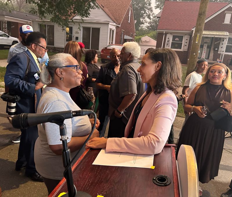 Detroit Mayor Mary Sheffield, right, and resident Cynthia Loggins speak during a press conference where the city celebrated the first of 3,000 new streetlights that are being installed around the city.