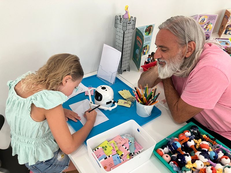 Emersyn, 8, and her dad Chuck Kallil, of Canton, went to Stemville in Northville on Thursday, July 16, 2026, to avoid the wildfire smoke in Metro Detroit. "We decided instantly we were not going to spend any more minutes outside than we had to," Chuck Kallil said.
