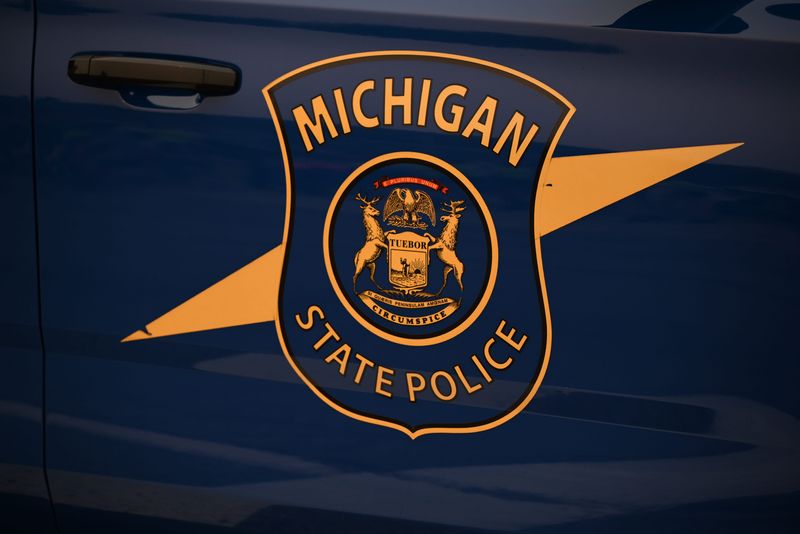 The insignia of the Michigan State Police is seen on a patrol car in Port Huron on Wednesday, July 15, 2026.