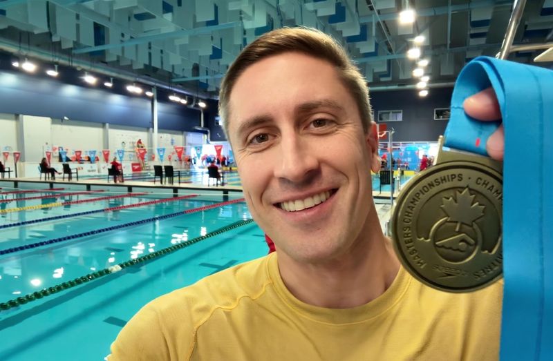 Former Brighton High School swimmer Kevin Doak set a 45-49 age group world record in the 100-meter short-course backstroke at a meet in Ontario.