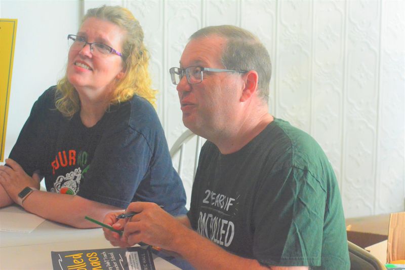 Alongside his wife, Laura Hall, retired Cheboygan Area Schools teacher Eric Hall was on hand to sign copies of his book, “Controlled Chaos: Lessons They Didn’t Teach You in Teacher School,” during a book signing event at the Melody’s Lane and the Book Store in Cheboygan on Friday, July 17.