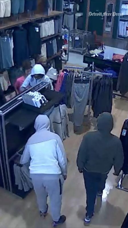 Police are investigating after they say eight people entered and stole more than $10,000 in Nike apparel from a Dick's Sporting Goods in Bloomfield Township.