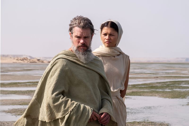 Greek king Odysseus (Matt Damon, left) confides in the goddess Athena (Zendaya) in a scene from "The Odyssey."