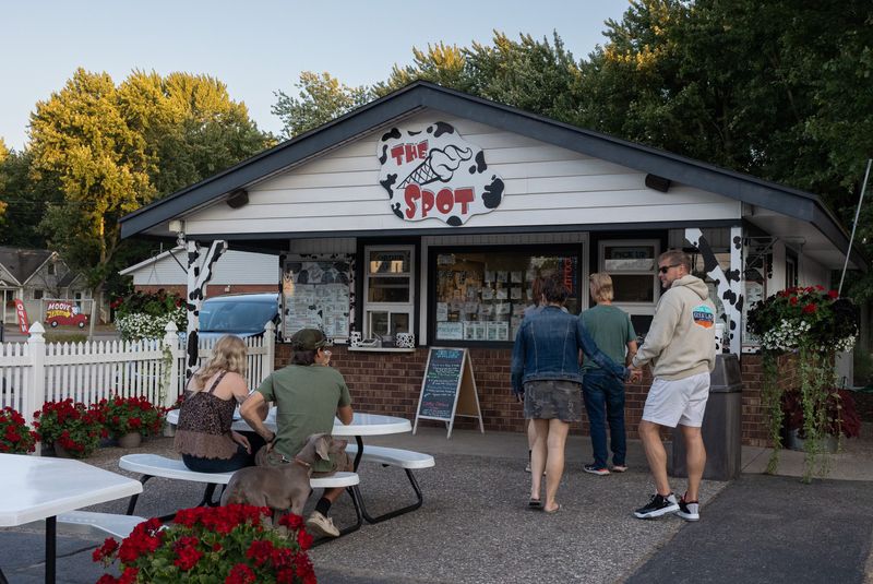 Ice cream fans enjoy treats and place orders July 22 at The Spot in Zeeland.