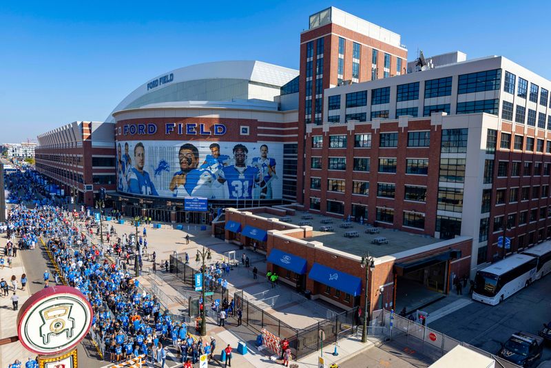 Sep 14, 2025; Detroit, Michigan, USA; A general view of the exterior of the stadium as fans arrive prior to the game between the Chicago Bears and the Detroit Lions at Ford Field. Mandatory Credit: David Reginek-Imagn Images