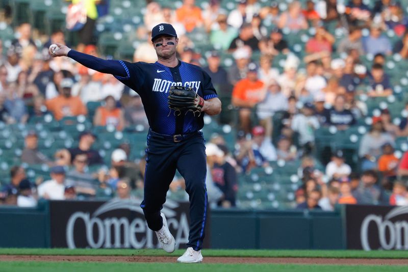Detroit Tigers third baseman Colt Keith (33) makes a throw to first in the fourth inning against the Baltimore Orioles at Comerica Park in Detroit on Monday, July 27, 2026.