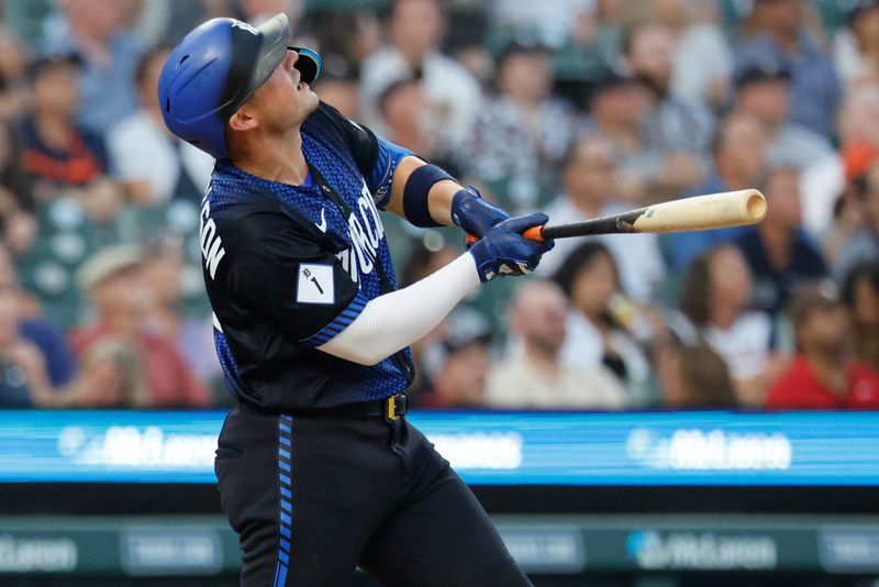 Detroit Tigers first baseman Spencer Torkelson (20) hits a sacrifice fly in the fifth inning against the Baltimore Orioles at Comerica Park in Detroit on Monday, July 27, 2026.
