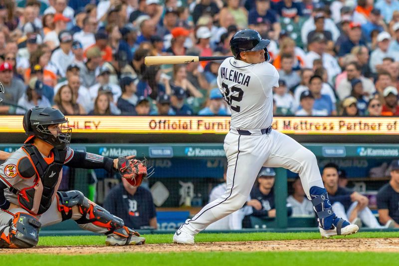 Jul 28, 2026; Detroit, Michigan, USA; Detroit Tigers catcher Eduardo Valencia (32) hits a single during the fifth inning against the Baltimore Orioles at Comerica Park. Mandatory Credit: David Reginek-Imagn Images