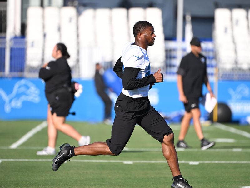 Cornerback Rock Ya-Sin warms up during Lions training camp.