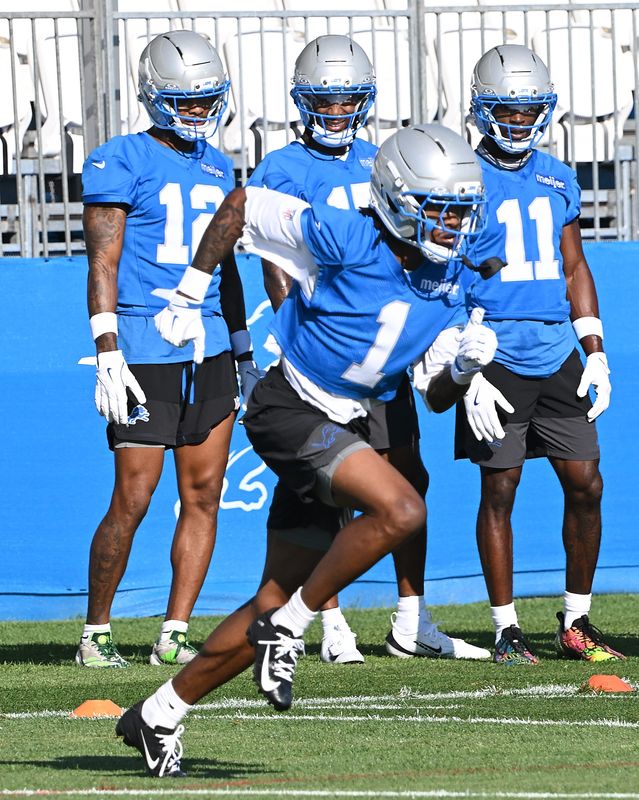 Wide receiver Jameson Williams goes through a drill during training camp.