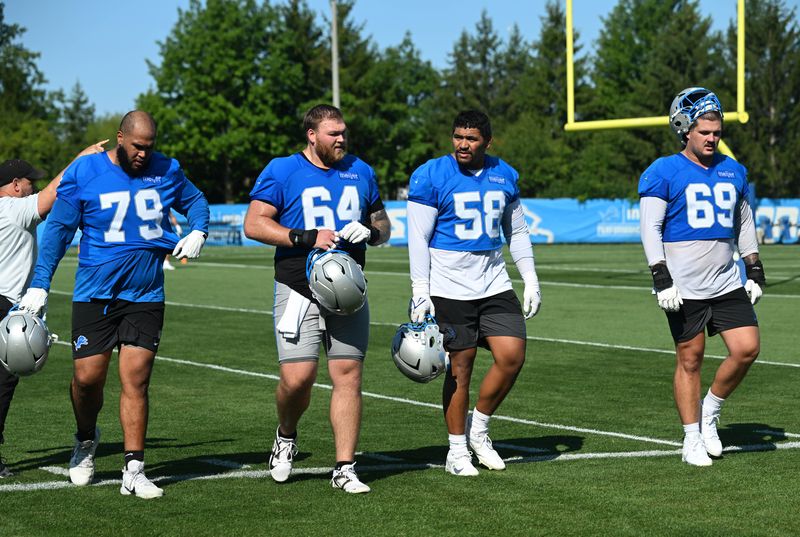 Lions center Cade Mays (64) will miss significant time after suffering a wrist injury during Sunday's practice.