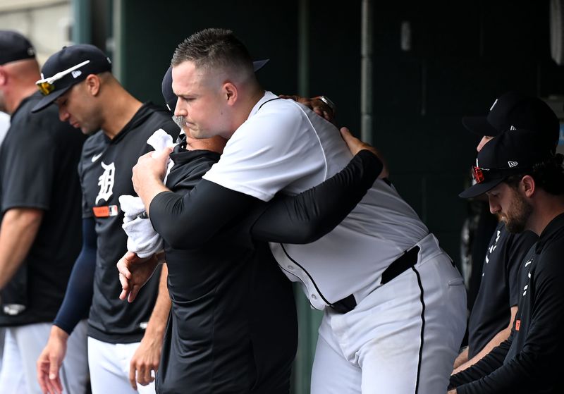 Tigers manager AJ Hinch hugs pitcher Tarik Skubal after his last home start at Comerica Park.