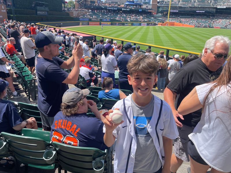 Tyrus Di Ponio, a 10-year-old from Windsor, Ontario, caught a ball from Detroit Tigers ace Tarik Skubal after he completed his long toss warmup at Comerica Park on Wednesday, July 29, 2026, possibly his last game with the Tigers.