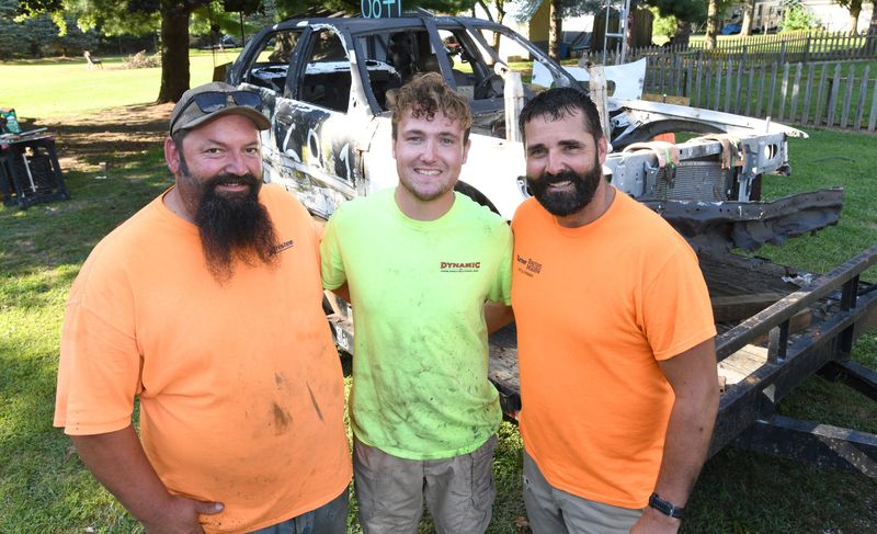 Adam Goldsmith, Kyle Goldsmith and Aaron Goldsmith have been part of the demolition derby circuit since Adam and Aaron were in high school. This will be Kyle's fifth Monroe County Derby as they prepare to paint his car red, white and blue.
