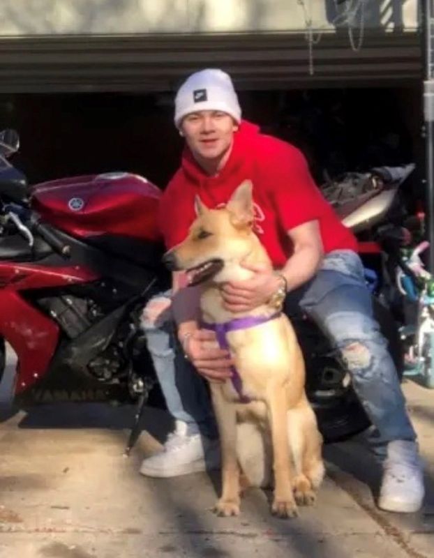 Ethan Bennett is with his emotional support dog, Athena. He died at 19 in 2023 in a motorcycle crash in Inkster.