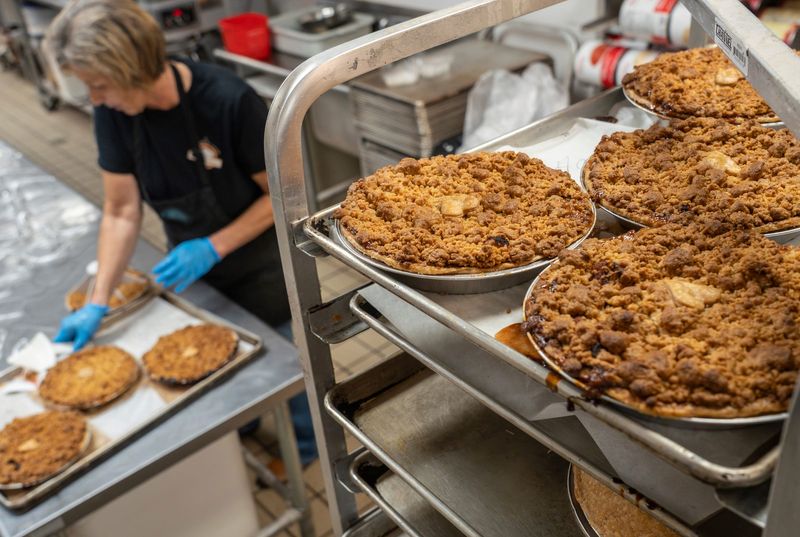 Grand Traverse Pie Company general manager Christina McCreey works on cutting slices of pie for a catering order at the Plymouth location on Thursday, July 30, 2026.

Jenessa Mutschler manager