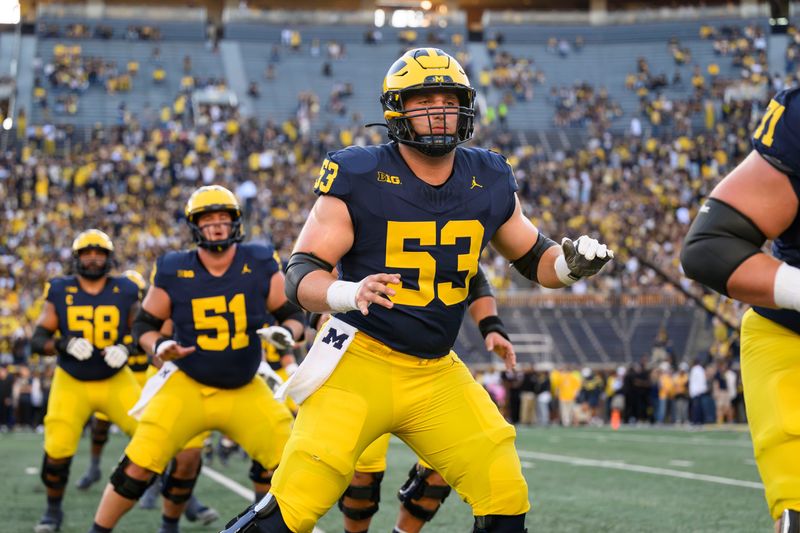 New Michigan head coach Kyle Whittingham believes offensive lineman Jake Guarnera (53) is an "all-Big Ten-caliber player."