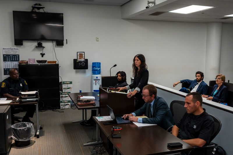 Defense attorney Allison Kriger looks at a witness during the preliminary examination in the case involving the June 22 police shooting of Alonzo Lee-Perkins inside the 36th District Court in Detroit on Friday, July 31, 2026.