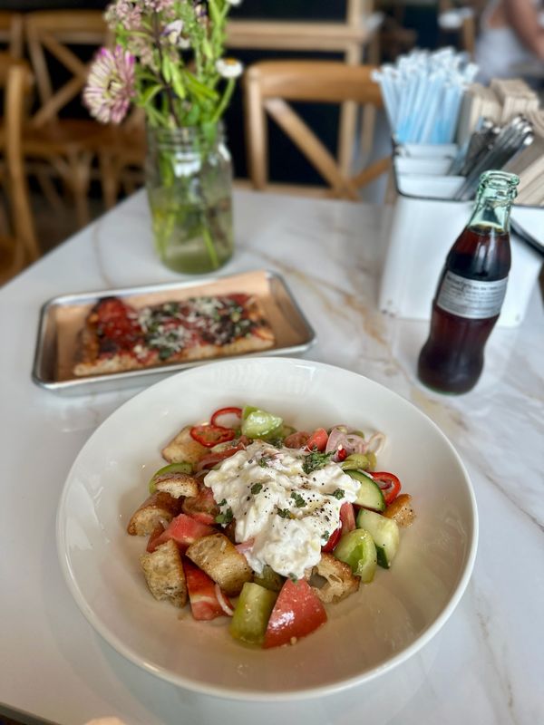The panzanella from Cardoon Cafe in Sylvan Lake has tomatoes, cucumbers, garlic croutons, stracciatella cheese and a little kick from fresno chilis.