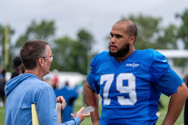 Aug 2, 2026; Allen Park, MI, USA; Detroit Lions offensive lineman Larry Borom (79) gives an interview following Detroit Lions training camp at Meijer Performance Center. Mandatory Credit: Paul Barnick-Imagn Images