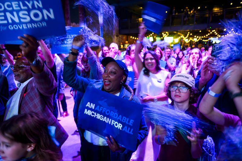 Supporters cheer during a primary election watch party for Michigan Secretary of State and gubernatorial candidate Jocelyn Benson on Tuesday, Aug. 4, 2026 at Garden Theater in Detroit.