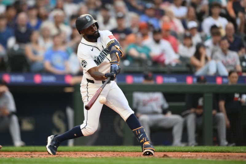 Seattle Mariners left fielder Randy Arozarena (56) hits a single against the Detroit Tigers during the fourth inning at T-Mobile Park in Seattle on Tuesday, Aug. 4, 2026.