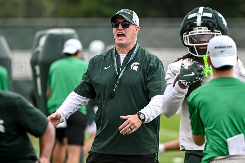 Michigan State’s head coach Pat Fitzgerald calls out to players during football practice on Thursday, Aug. 6, 2026, in East Lansing.