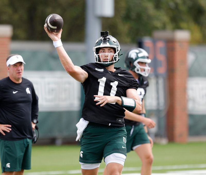 Michigan State quarterback Alessio Milivojevic runs a drill during football practice, Thursday, Aug. 6, 2026, in East Lansing, Mich.