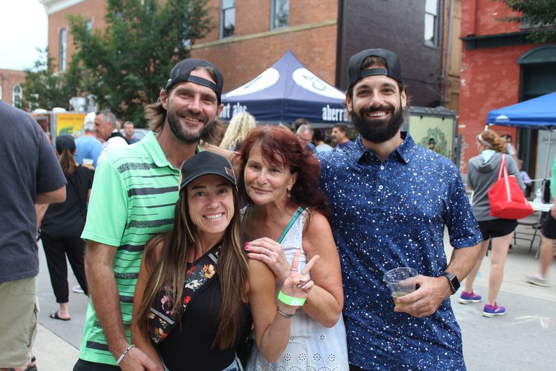 Howell residents and visitors enjoy live music during Rock the Block on Aug. 6, 2026, in Howell.