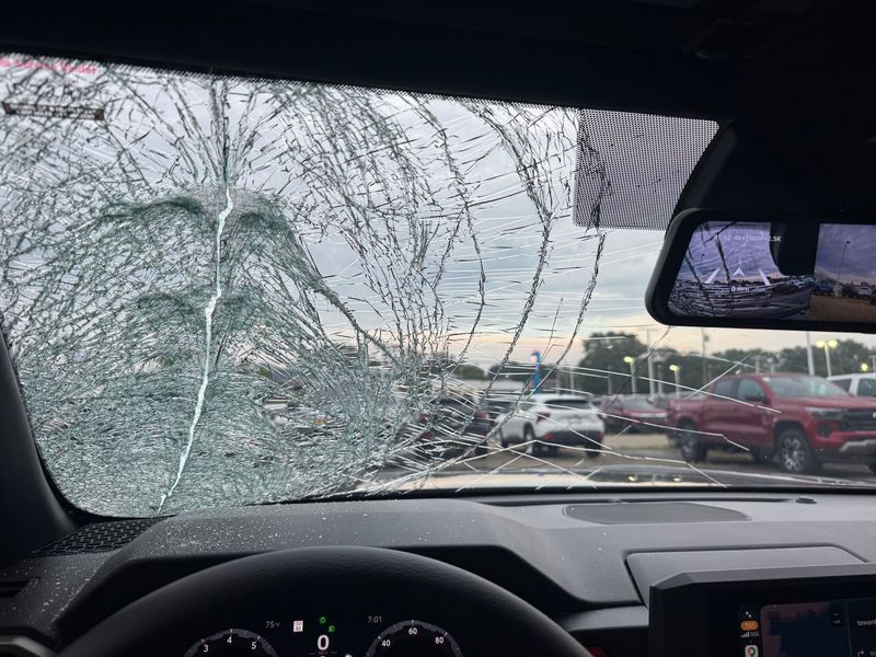 The windshield of Tony Boehm's Toyota Tacoma was shattered by debris that flew from a truck on northbound Interstate 275 in Canton Township Aug. 7, 2026.