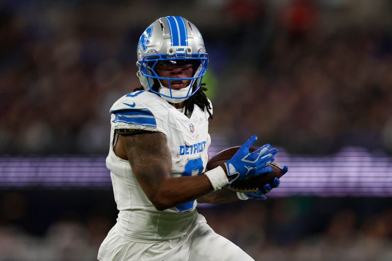 Sep 22, 2025; Baltimore, Maryland, USA; Detroit Lions running back Jahmyr Gibbs (0) rushes the ball against the Baltimore Ravens during the first half at M&T Bank Stadium. Mandatory Credit: Peter Casey-Imagn Images