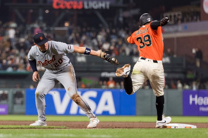 Detroit Tigers first baseman Spencer Torkelson (20) fails to tag San Francisco Giants second baseman Osleivis Basabe (39) during the sixth inning at Oracle Park in San Francisco on Friday, Aug. 7, 2026.
