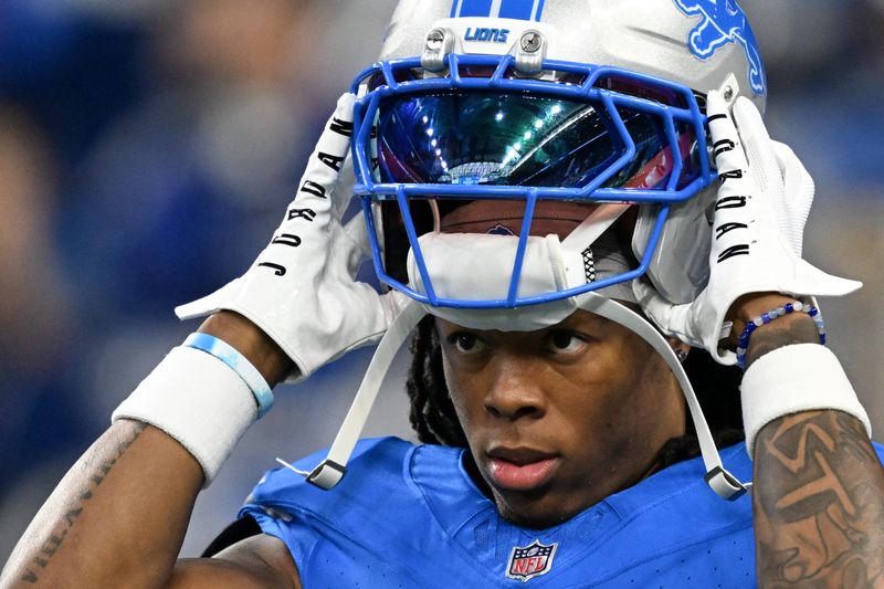 Sep 14, 2025; Detroit, Michigan, USA; Detroit Lions running back Jahmyr Gibbs (0) looks on during warmups prior to the game against the Chicago Bears at Ford Field. Mandatory Credit: Lon Horwedel-Imagn Images