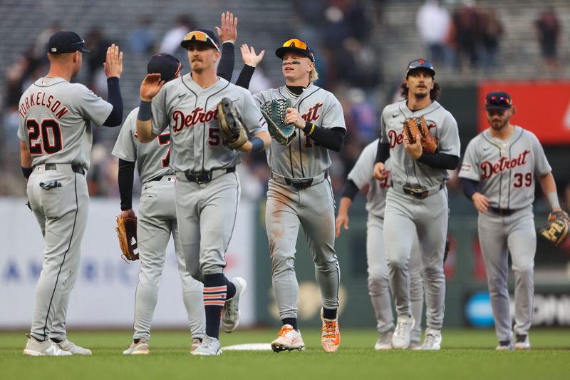 The Tigers celebrate their win over the San Francisco Giants at Oracle Park.
