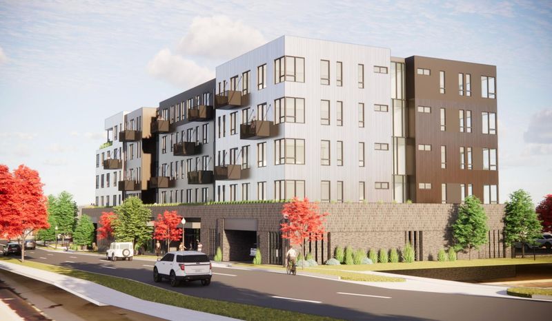 A rendering of a new five-story development planned for the west end of Seventh Street in Holland.