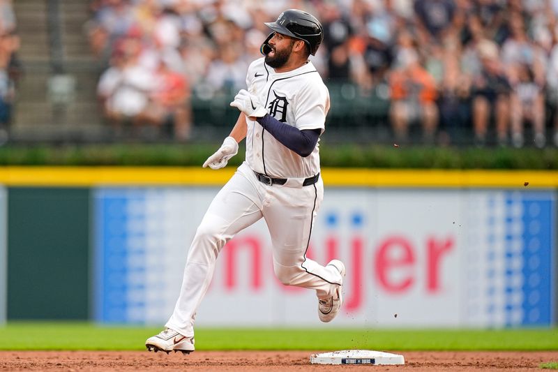 Detroit Tigers left fielder Riley Greene (31) runs past second base to score a run against Cleveland Guardians during the second inning at Comerica Park in Detroit on Tuesday, August 11, 2026.