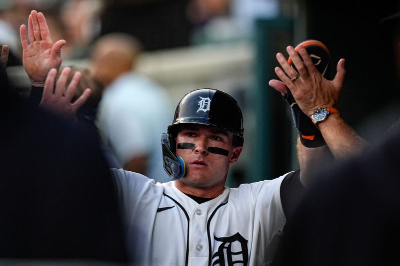Detroit Tigers third baseman Kevin McGonigle (7) celebrates scoring a run against Cleveland Guardians during the fifth inning at Comerica Park in Detroit on Tuesday, August 11, 2026.