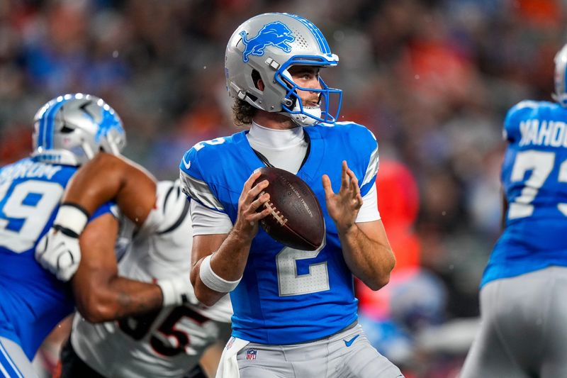 Detroit Lions quarterback Luke Altmyer (2)) drops back to throw a pass in the first quarter of the NFL Preseason game between the Cincinnati Bengals and the Detroit Lions at Paycor Stadium in Cincinnati on Thursday, Aug. 13, 2026.