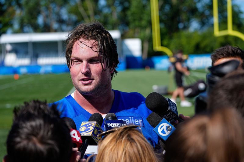 Lions tackle Blake Miller (76) speaks to media members after practice during training camp at Meijer Performance Center in Allen Park.