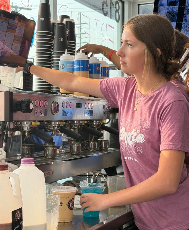 A 7 Brew employee prepares drinks at the new drive-thru beverage stand at 815 24th St. in Port Huron Township on Aug. 14, 2026.