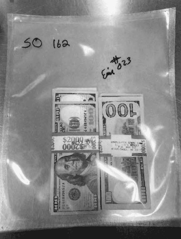 A photo included in a Lansing Police Department report of cash found inside an office bag following the June 20, 2024 arrest of state Rep. Neil Friske, R-Charlevoix. The report was obtained through a public records request placed with Attorney General Dana Nessel's office. Nessel's office closed a two-year investigation into the former lawmaker and concluded there was insufficient evidence to bring charges.