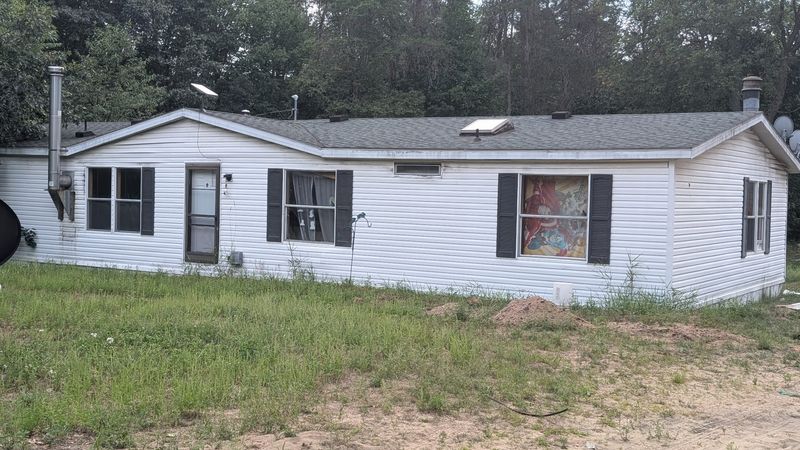The home on South LaChance Road in Missaukee County's rural Lake Township where three people were fatally shot and a fourth critically wounded in a mass shooting spree on Friday, Aug. 14, 2026. Photo taken on Aug. 15.