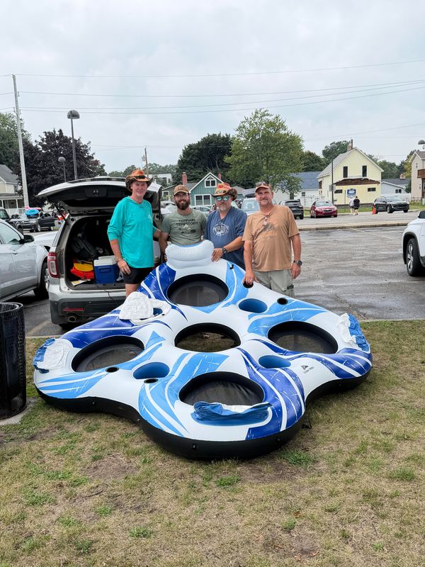 Charl Steyn (left) of Johannesburg, South Africa, and Willem Bestbier (left center), Henk Lemmer (right center) and Freddie Dreyer (right) of Cape Town, South Africa, prepare for their first Port Huron Float Down on Sunday, Aug. 16, 2026, in Port Huron.