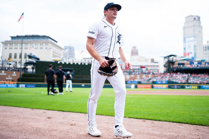 Detroit Tigers left fielder Brett Callahan (34) walks towards the dugout ahead of a game against the Chicago White Sox at Comerica Park in Detroit on Sunday, Aug. 16, 2026.